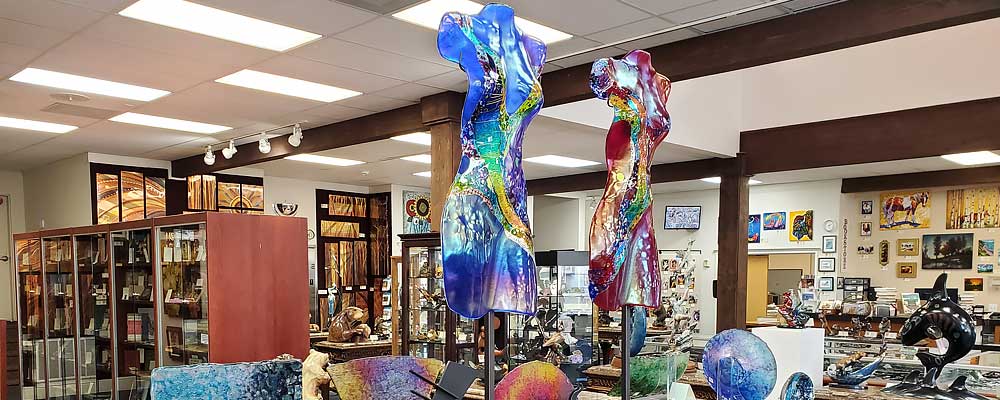 Gold Beach Books & Art Gallery - The Largest Display of Bronze Sculptures in Oregon